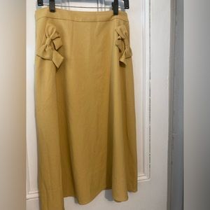 Collectif Mustard Yellow skirt with bows